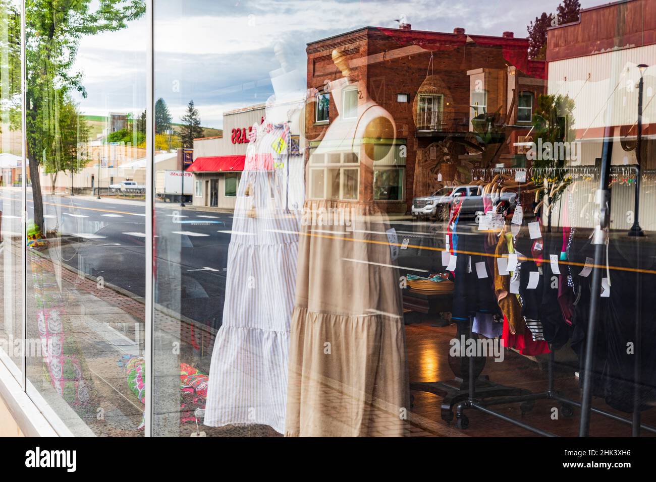 Colfax, Washington State, USA. Reflections in the window of a small