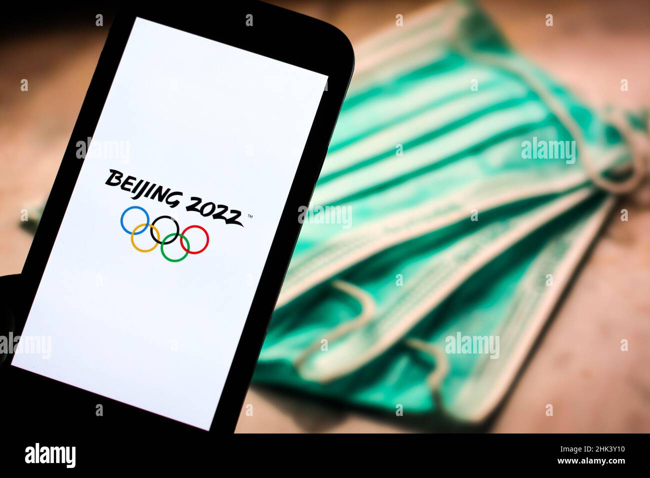In this photo illustration a Beijing 2022 Winter Olympic Games logo logo seen displayed in front of Stock Photo