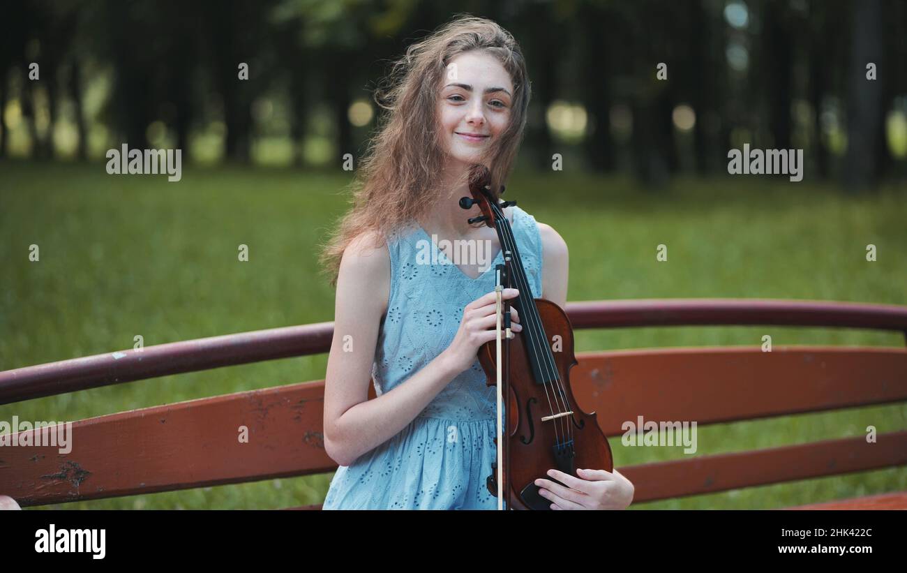 Portrait of a young girl with her violin Stock Photo - Alamy