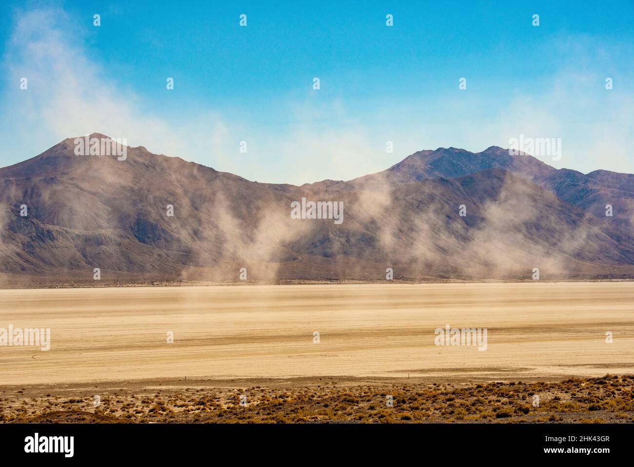 USA, Nevada, dusty Black Rock Desert windy Playa framed by Burnt Rock Peak Stock Photo