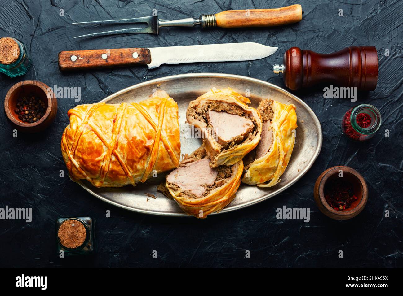English dish of beef tenderloin in puff pastry stuffed with mushrooms