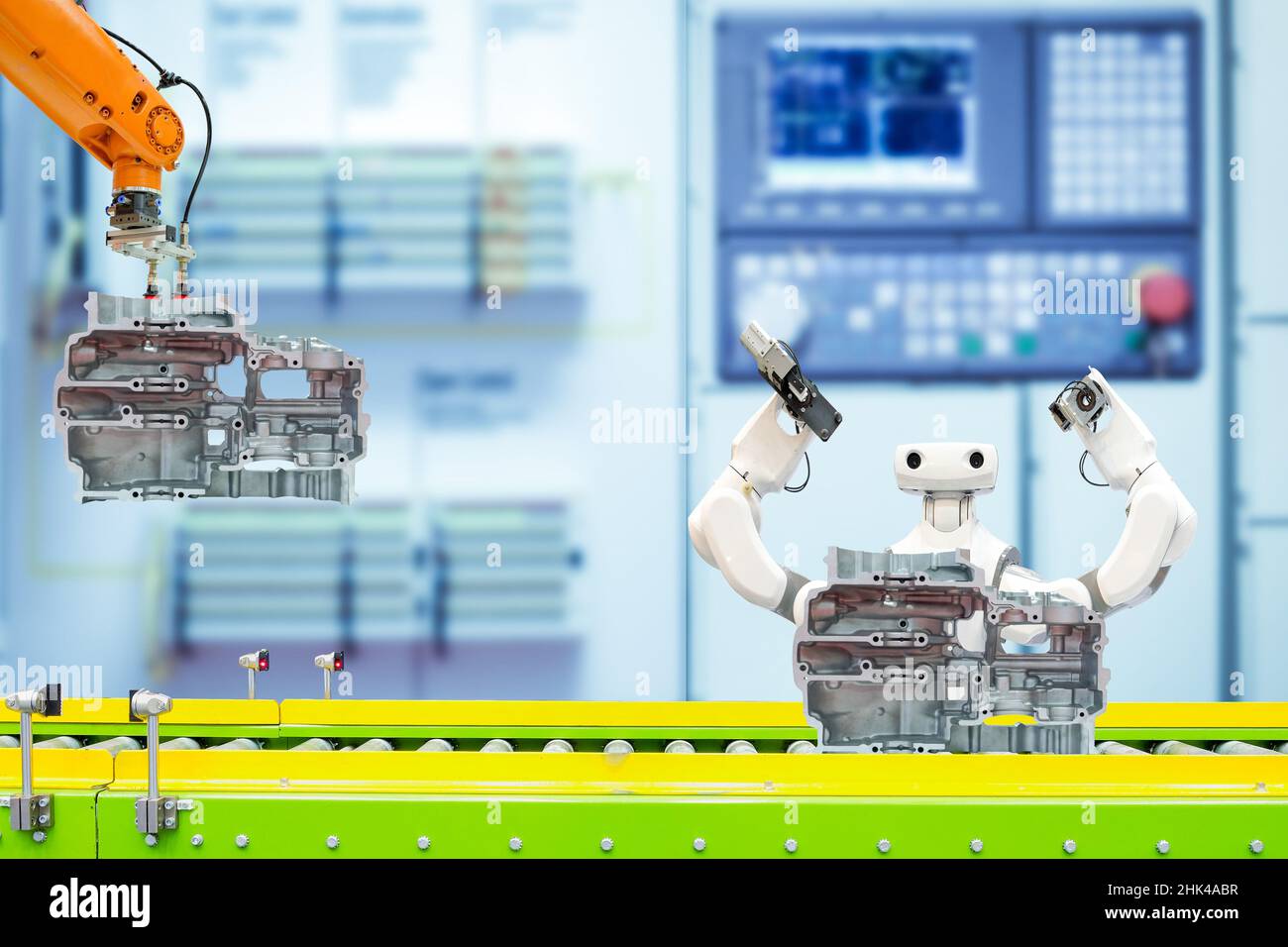 Industrial robotic teamwork working with auto parts via conveyor on smart factory Stock Photo