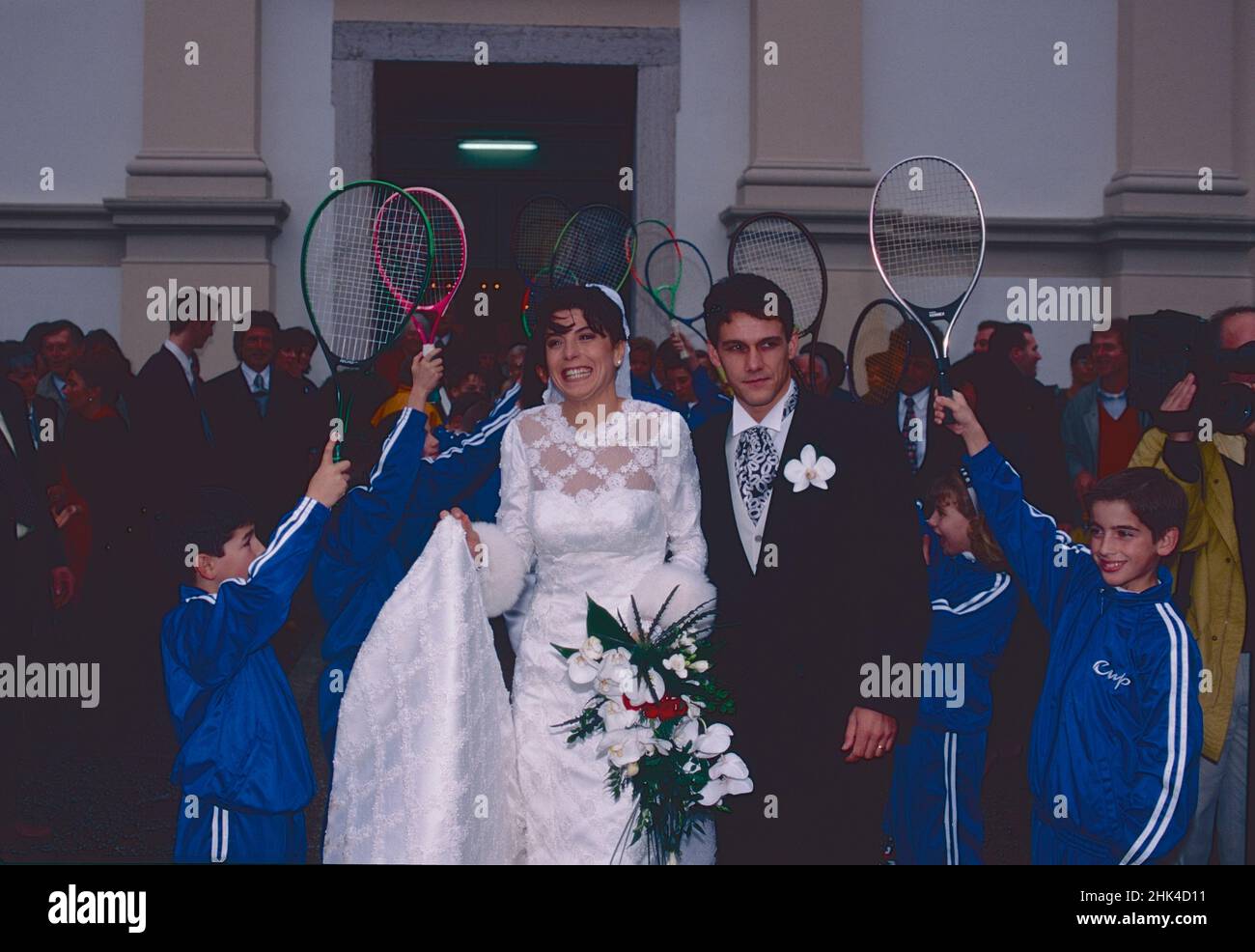 Italian tennis players Renzo Furlan and Nathalie Baudone getting