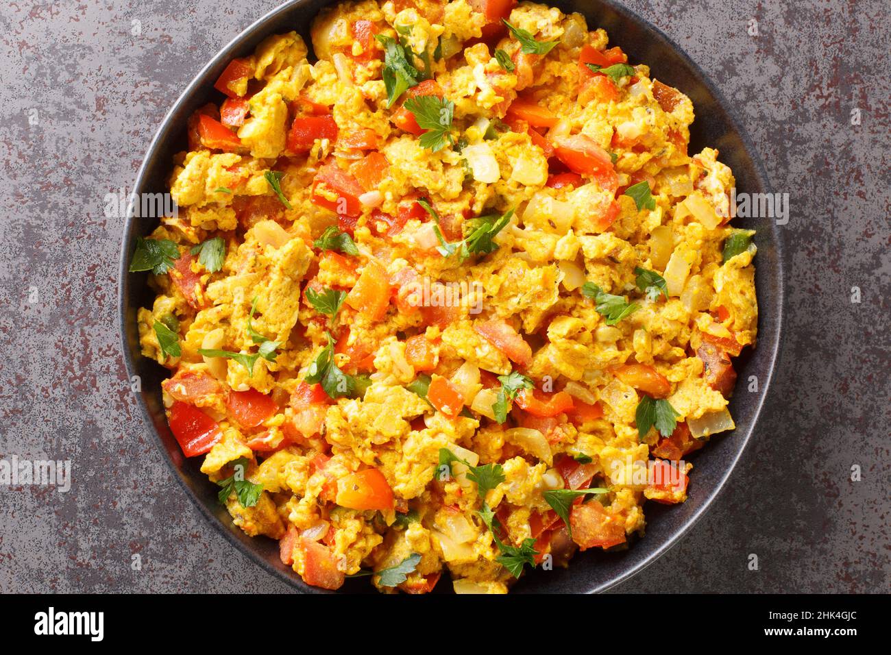 Egg Bhurji Spiced Indian Scrambled Eggs closeup in the plate on the