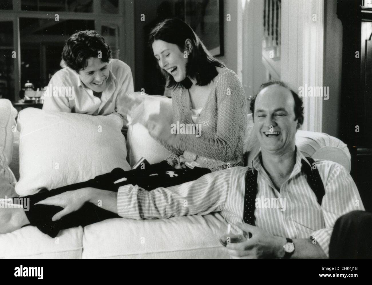 Actors Hugh Grant, Gina McKee, and Tim McInnerny in the movie Notting Hill, 1999 Stock Photo