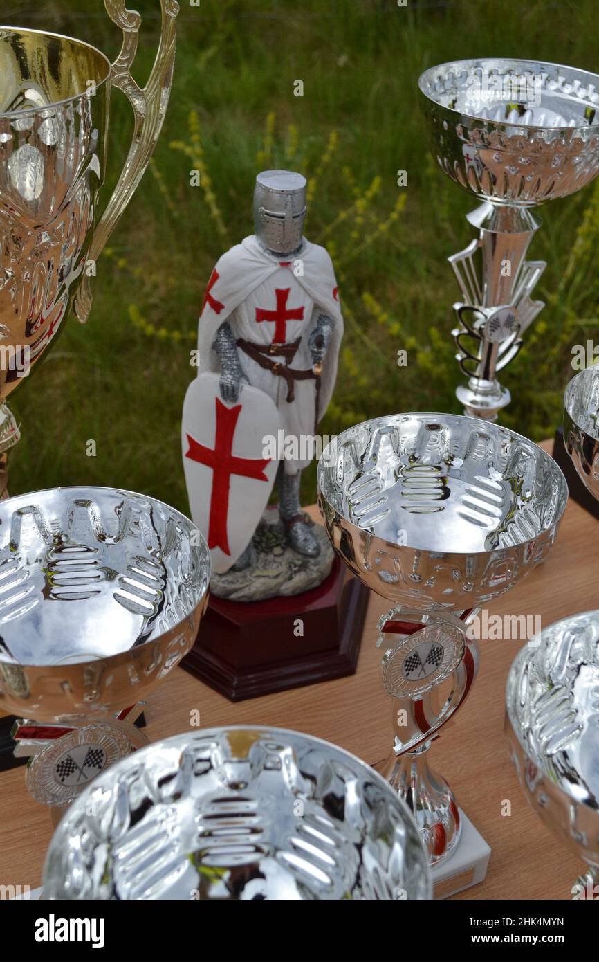 St George Man Trophy - England Flag On Shield - Winners Trophy - St George And Silver Trophy's - Yorkshire - UK Stock Photo