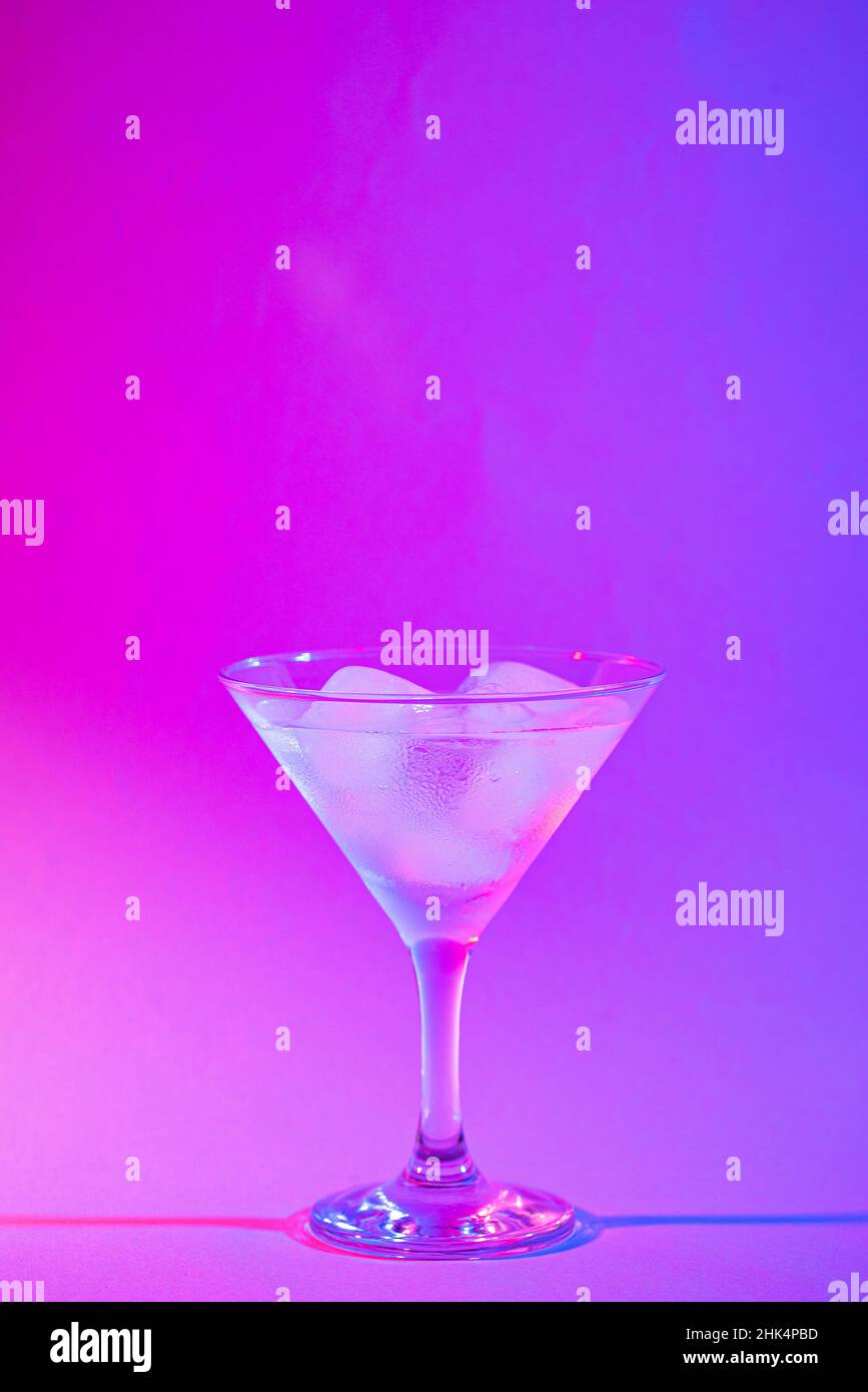 Martini cocktail in trendy neon light Stock Photo Alamy