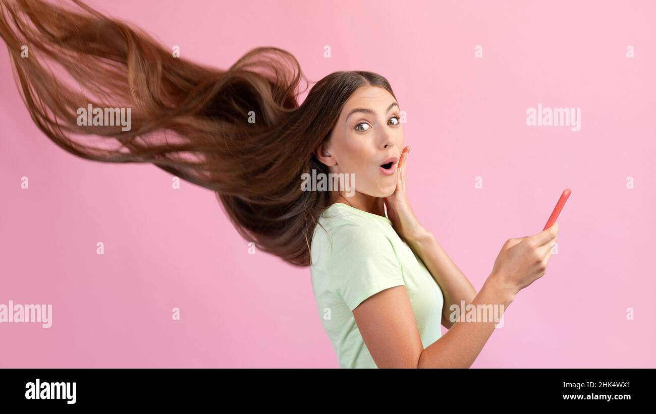 Profile side photo of surprised lady hairstyle fly use smartphone search hairdresser treatment sale repost isolated pastel color background Stock Photo