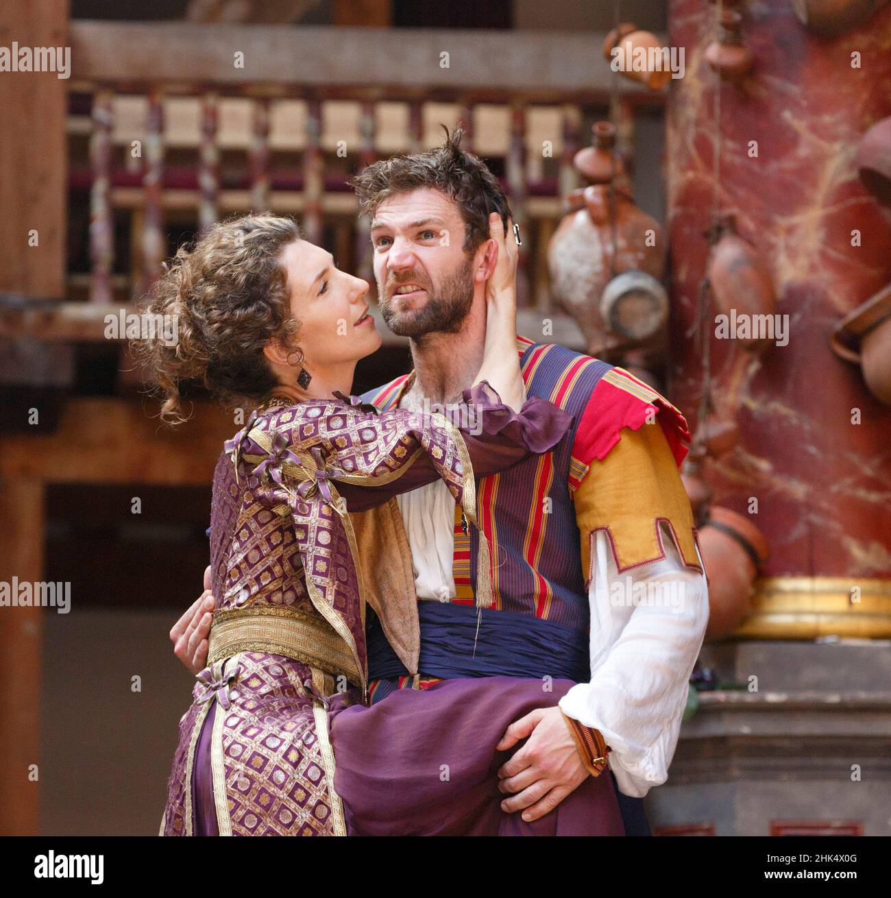 Hattie Ladbury (Adriana), Simon Harrison (Antipholus of Syracuse) in THE COMEDY OF ERRORS by Shakespeare at Shakespeare's Globe, London SE1  04/09/2014  design: James Cotterill   director: Blanche McIntyre Stock Photo