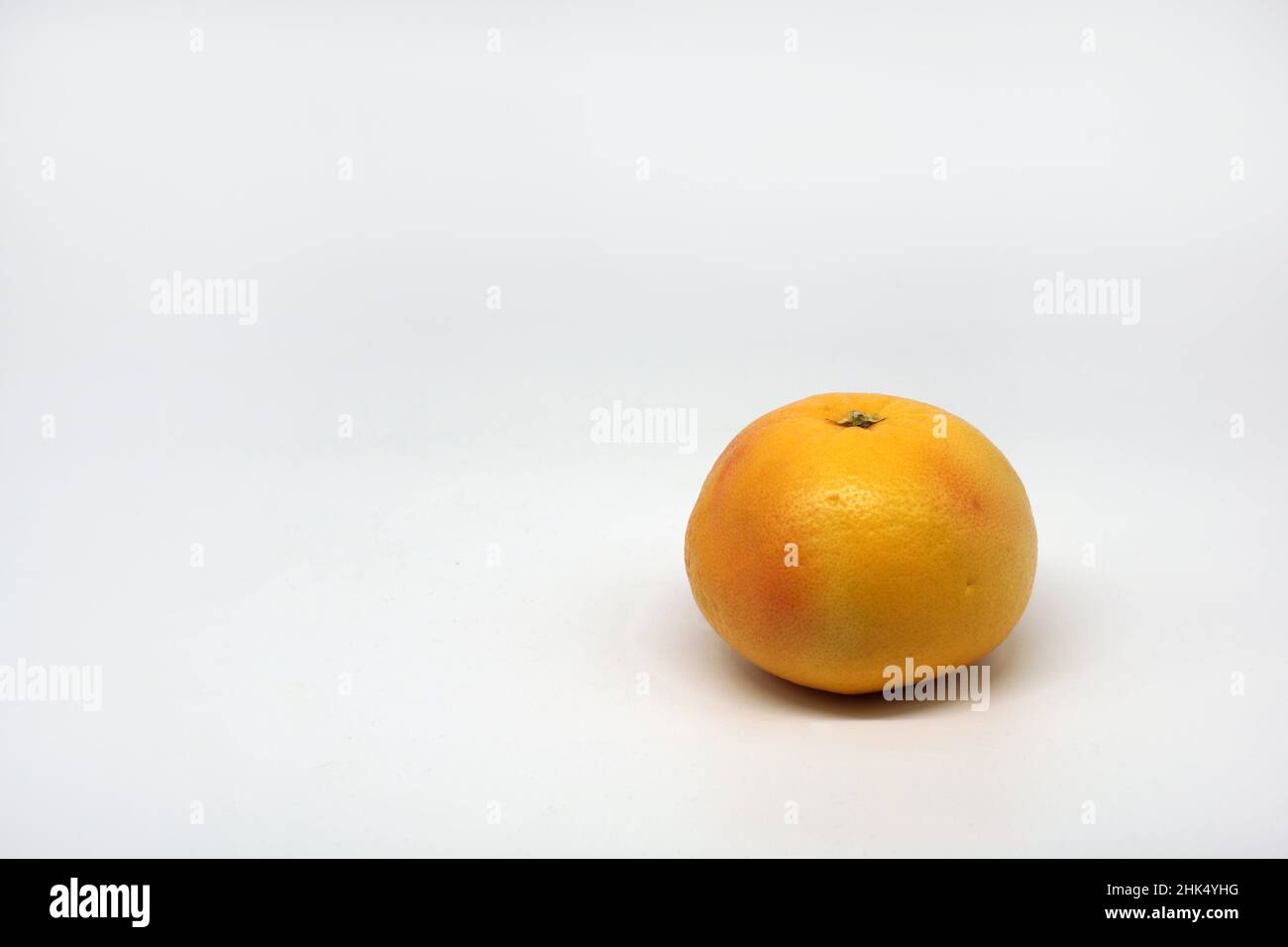 Yellow grapefruit isolated on white background Stock Photo