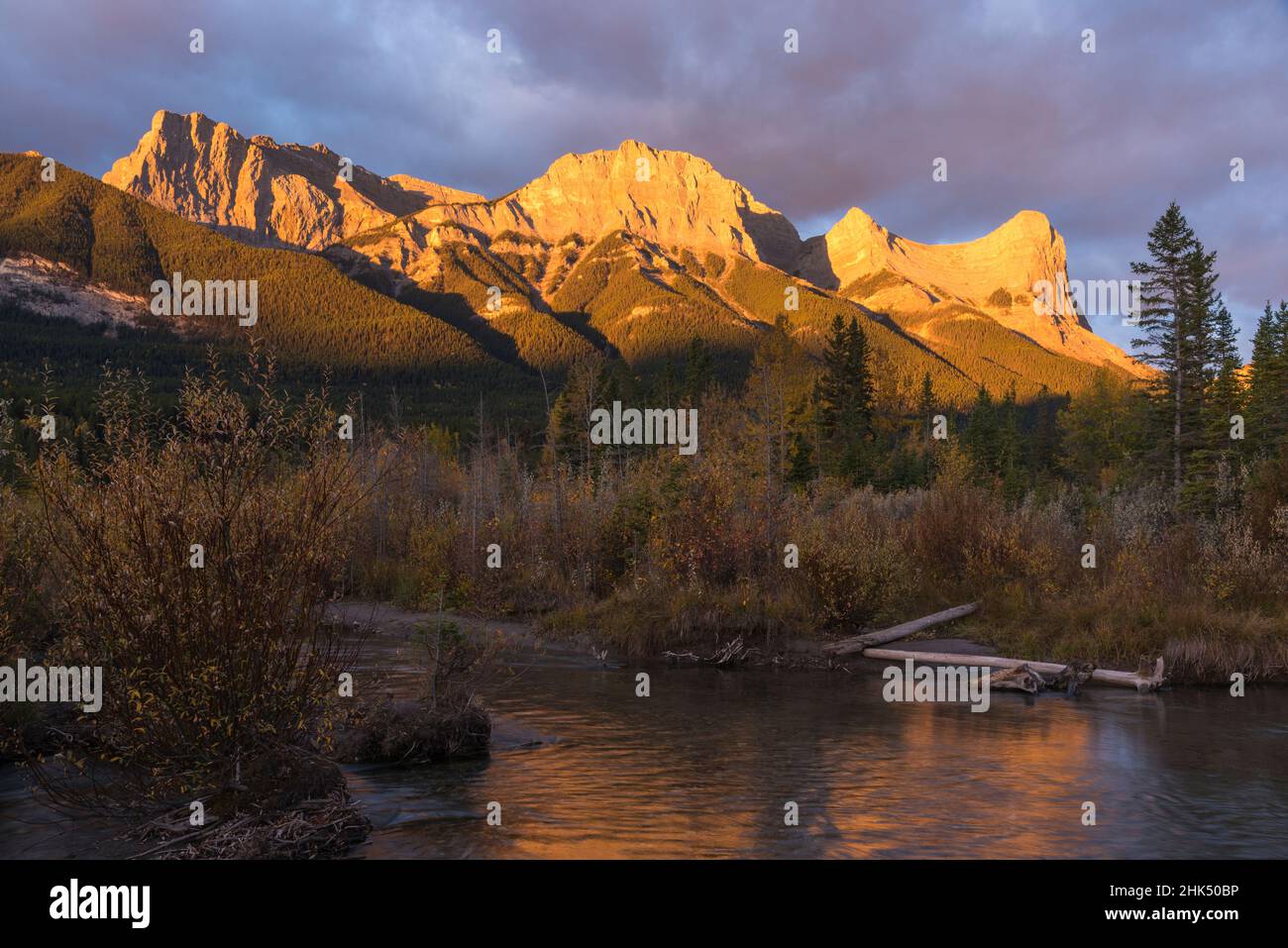 Colourful Sunrise over Ha Ling Peak and Mount Lawrence Grassi in autumn, Canmore, Banff, Alberta, Canadian Rockies, Canada, North America Stock Photo