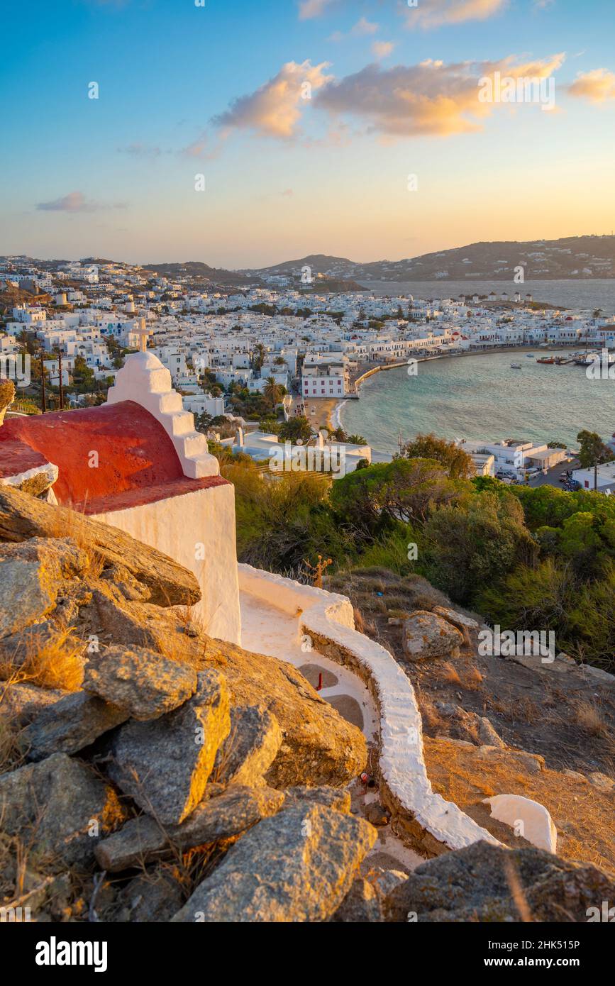 View of chapel and town from elevated view point at sunset, Mykonos Town, Mykonos, Cyclades Islands, Greek Islands, Aegean Sea, Greece, Europe Stock Photo