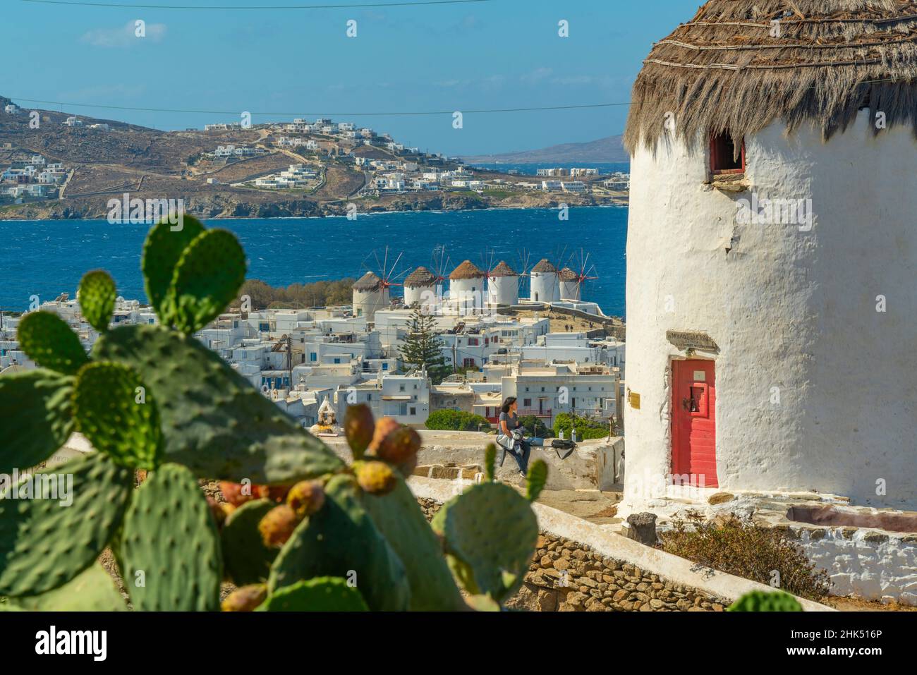 Elevated view of windmills and town, Mykonos Town, Mykonos, Cyclades Islands, Greek Islands, Aegean Sea, Greece, Europe Stock Photo