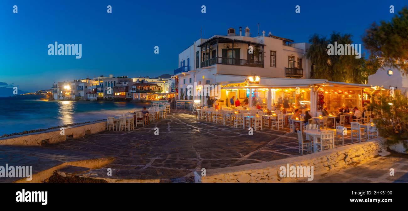 View of restaurants in Little Venice and town at night, Mykonos Town
