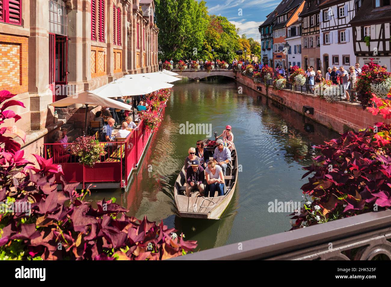 Cafe at the market hall beside Lauch River, Petite Venise district, Colmar, Alsace, Haut-Rhin, France, Europe Stock Photo
