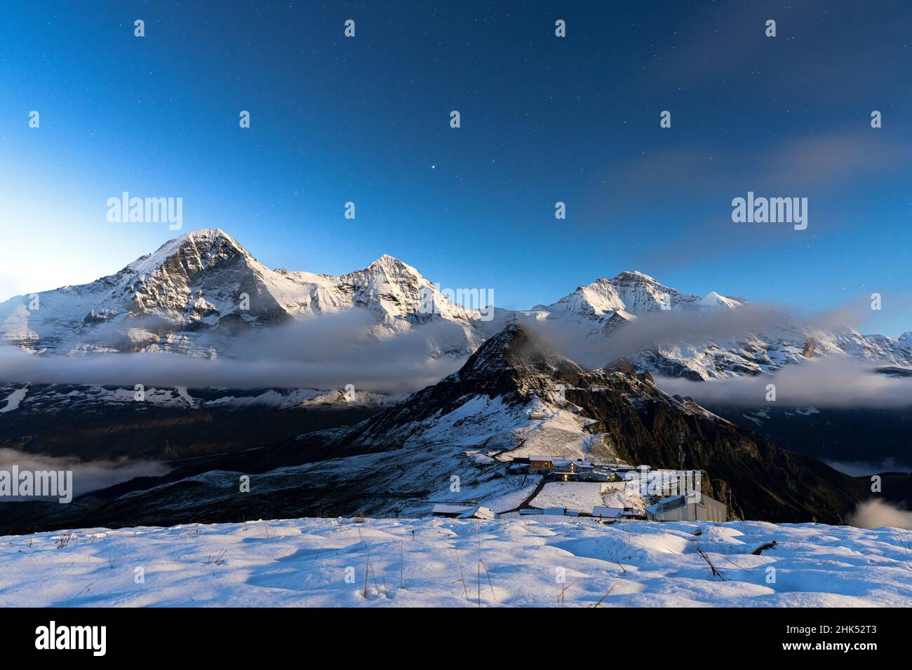 Night view of Eiger, Monch and Jungfrau mountains covered with snow from Mannlichen, Bern Canton, Swiss Alps, Switzerland, Europe Stock Photo