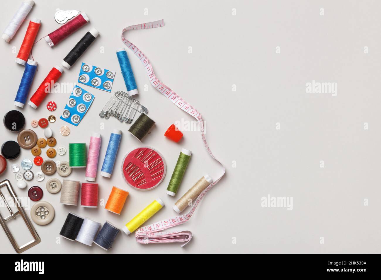 Sewing tools and accessories. Threads, needles, buttons, measuring tape ...