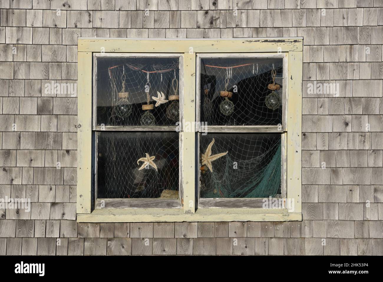 Fisherman's shed window, Peggy's Cove, Nova Scotia, Canada, North America Stock Photo