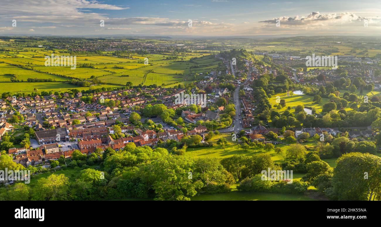 Aerial view of Glastonbury on a sunny summer evening, Somerset, England, United Kingdom, Europe Stock Photo