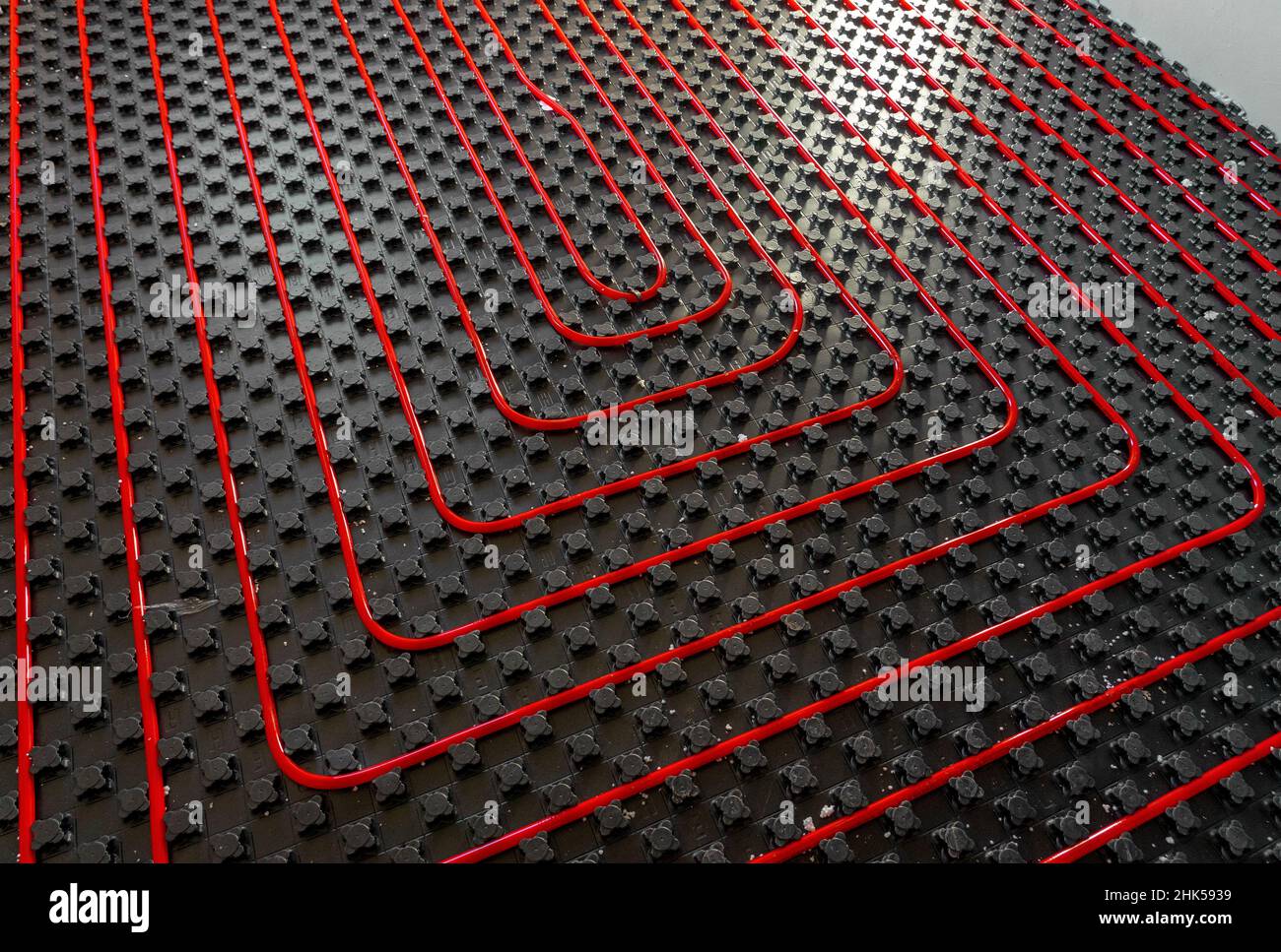 fllor heating pipes in the house under construction with light Stock Photo