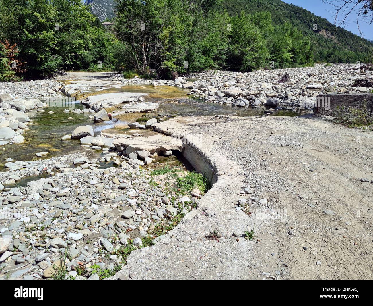 Greece, Epirus, river bank where the road became impassable in the National Park of Tzoumerka- Peristeri- Arachthos Gorge and Acheloos valley; Stock Photo
