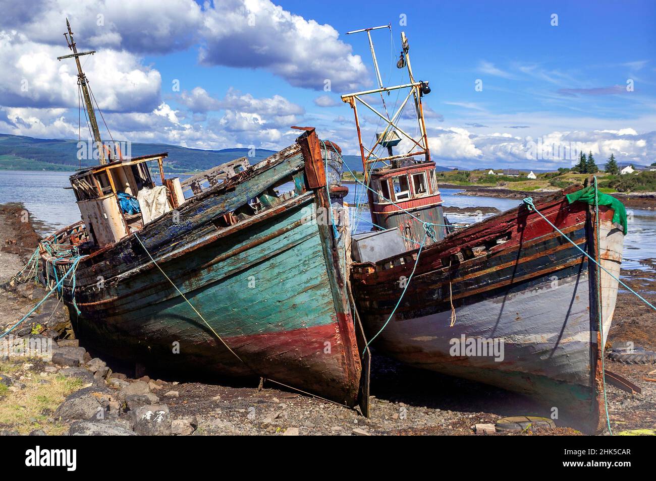 Beached & abandoned herring fishing boats as result of dying industry near Salen,Isle of Mull, Inner Hebrides, Argyll and Bute, Scotland, UK, Europe Stock Photo