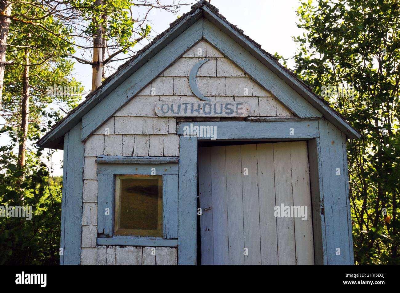 A wooden outhouse stands on the rural property in Lower Bedeque, Prince