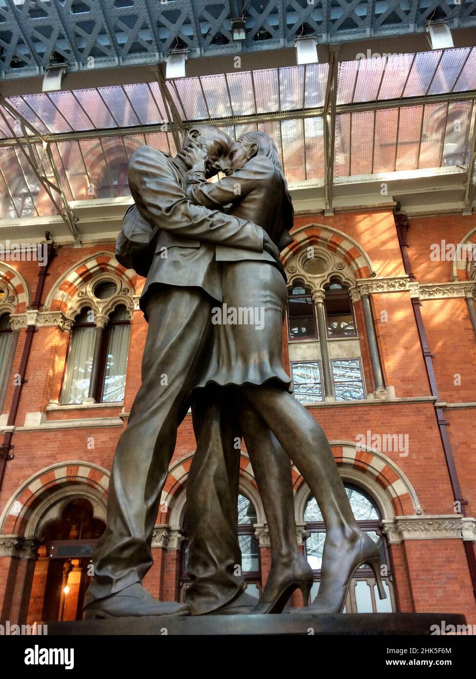 St Pancras, London, is one of the busiest railway stations in the UK. It is graced by stunning Victorian-age iron and glass architecture- as well as t Stock Photo