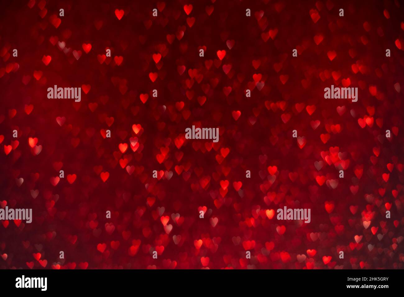 Red hearts, sparkling glitter bokeh background, valentines day abstract ...