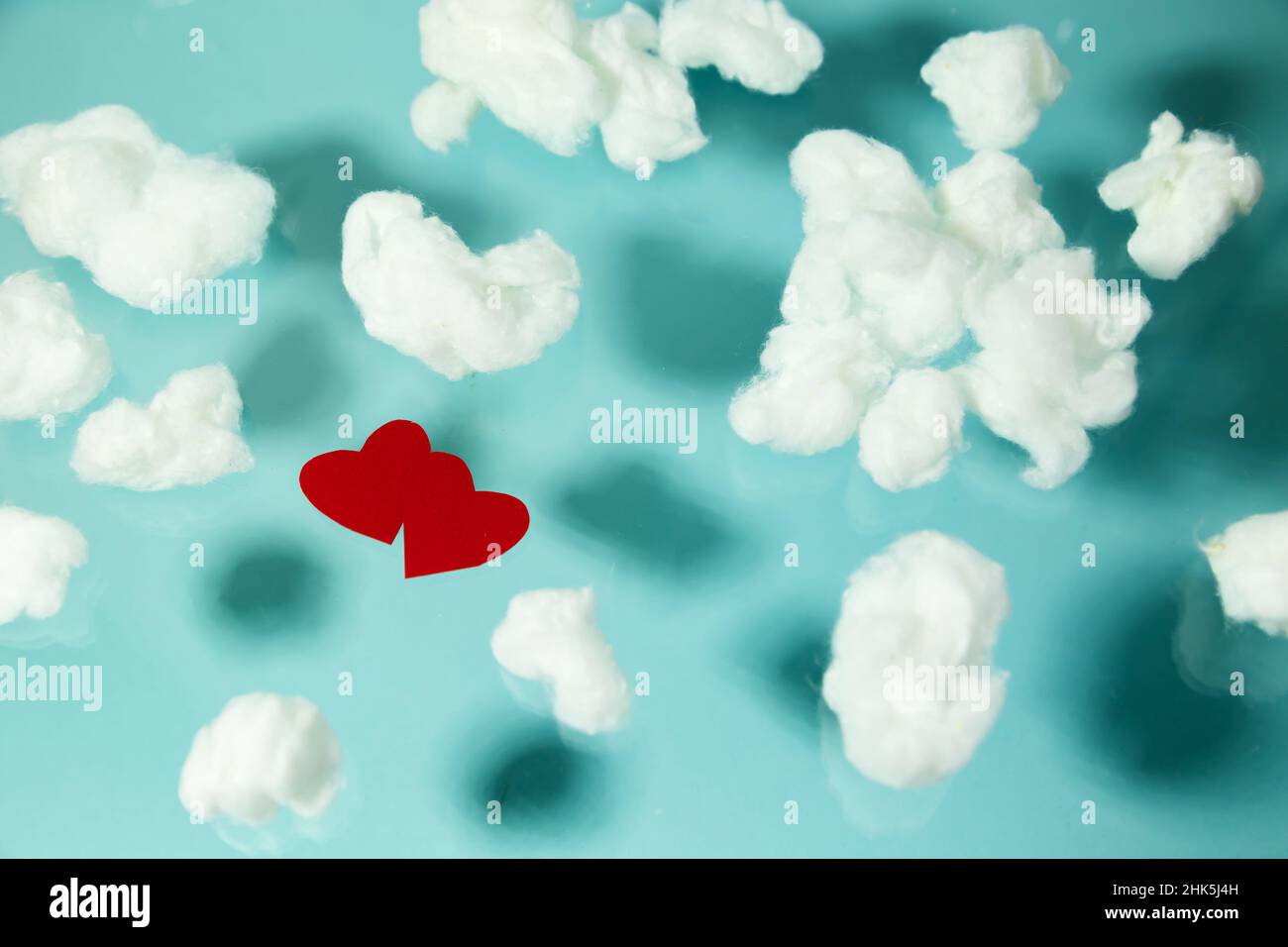 Red heart cotton clouds on hi-res stock photography and images - Alamy