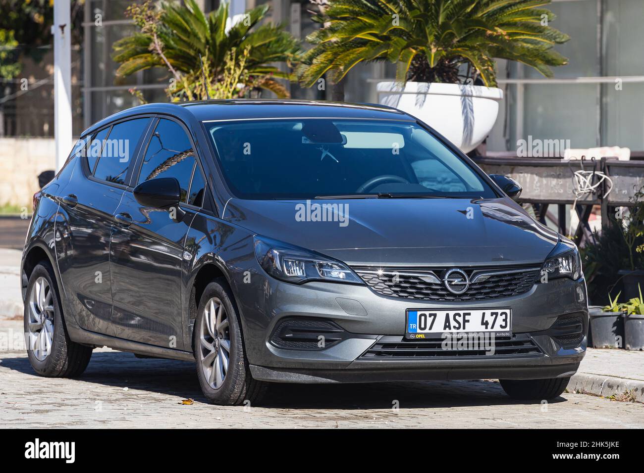 Side, Turkey -January 23, 2022: gray Opel Astra K is parked on the street  on a warm day against the backdrop of a buildung, trees, shops Stock Photo  - Alamy