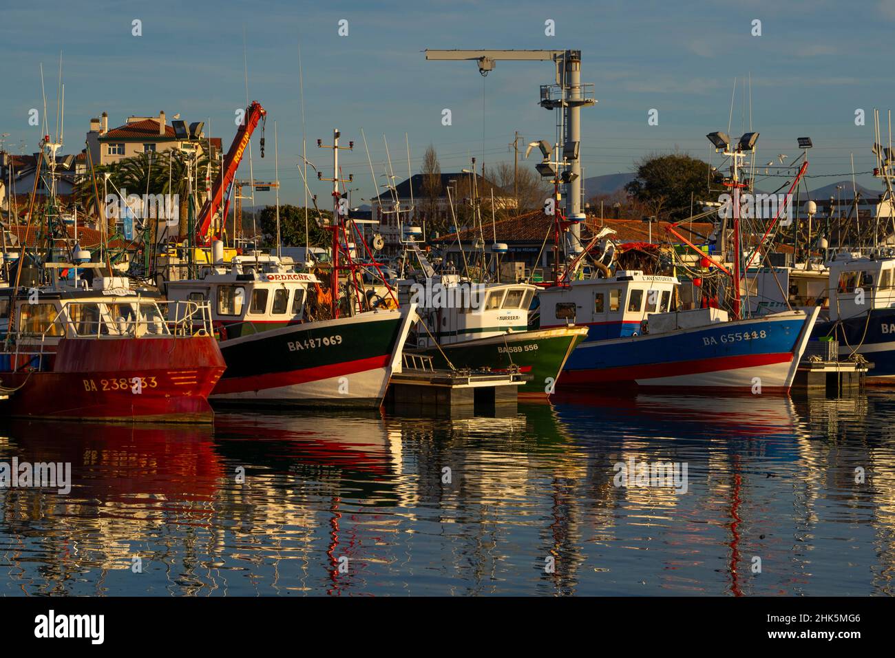 Fishing boats in the harbour of Saint Jean de Luz, Basque Country, Pyrenees Atlantiques, France Stock Photo