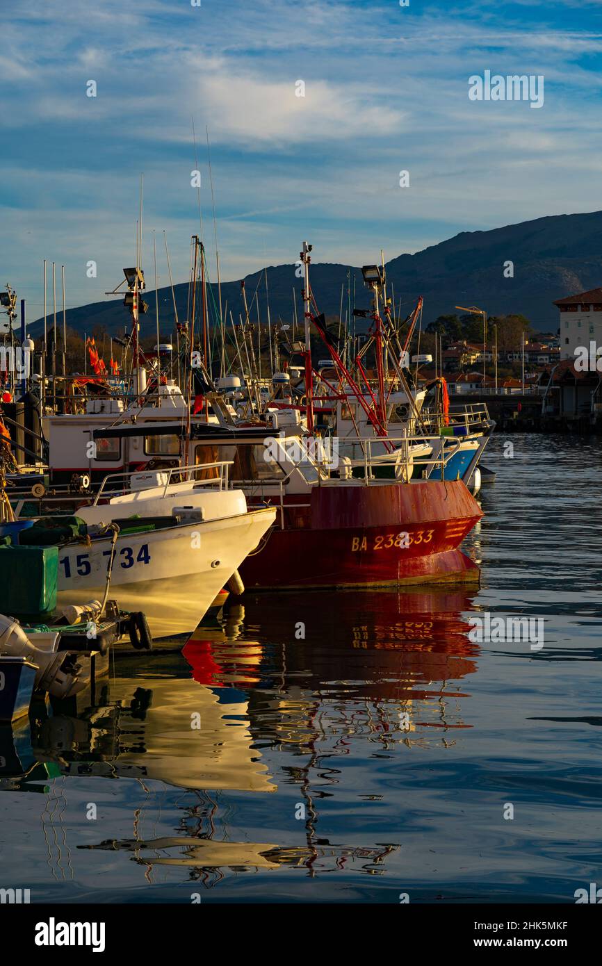 Fishing boats in the harbour of Saint Jean de Luz, Basque Country, Pyrenees Atlantiques, France Stock Photo