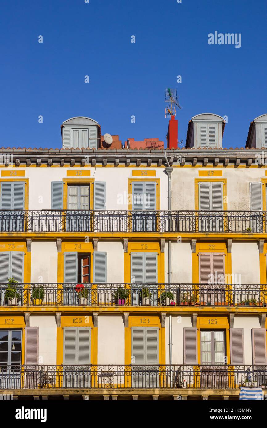Shutters of the apartment building of the central square in San