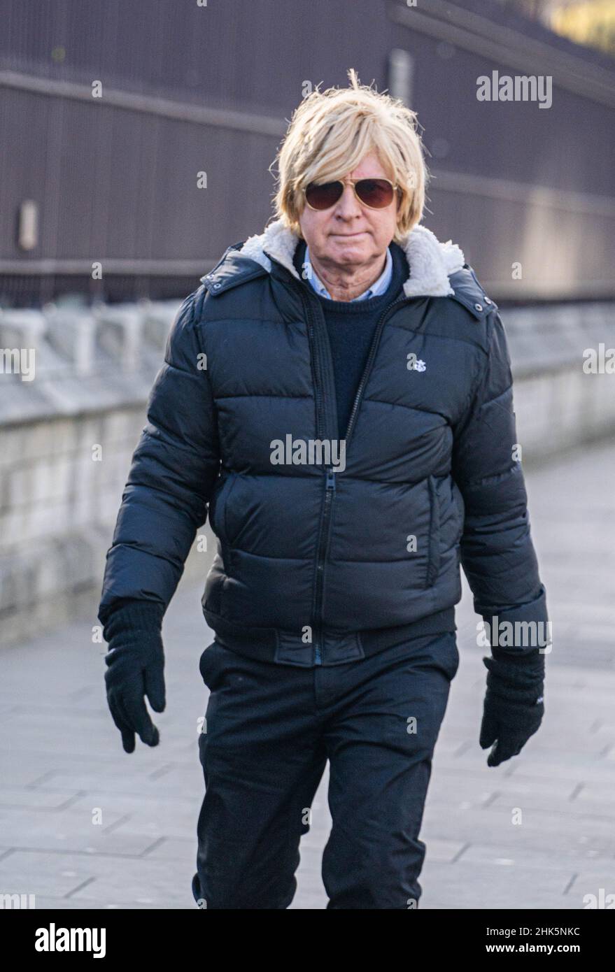 WESTMINSTER LONDON, UK. 2  February, 2022. Michael Fabricant, Conservative Member of Parliament for Lichfield in Staffordshire arrives at parliament in Westminster. Credit: amer ghazzal/Alamy Live News Stock Photo