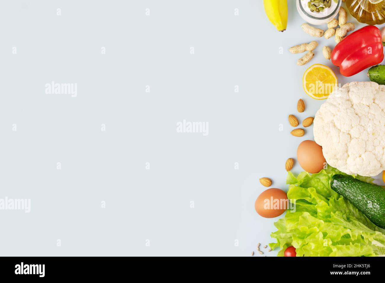 Food banner with organic vegetables and fruits, olive oil, nuts, seeds