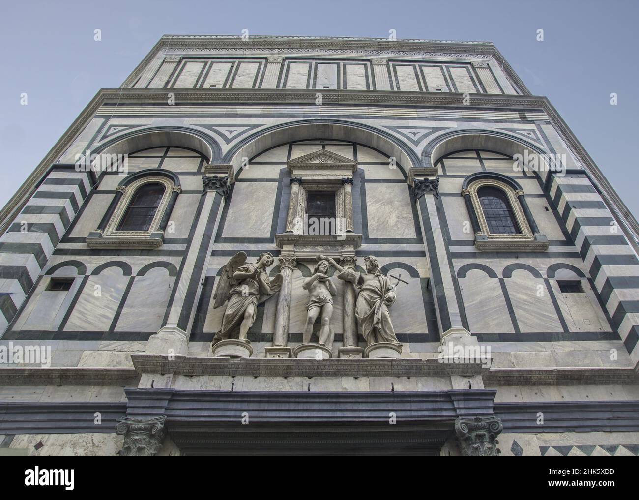 Jesus baptism scene, statues on the facade of Santa Maria del Fiore. Stock Photo