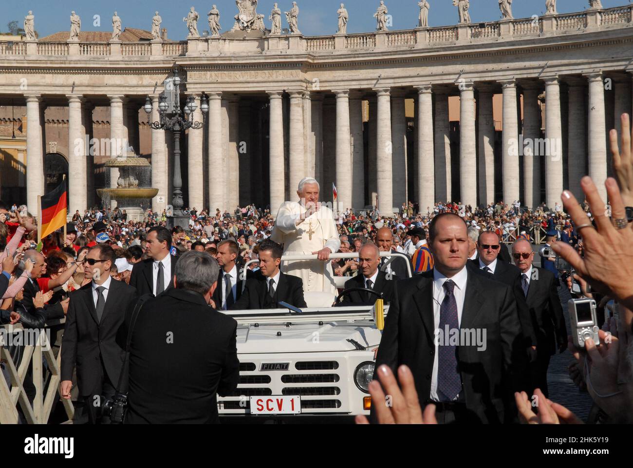 Vatican State in Rome, Italy 17/10/2007: Wednesday Pray, Benedetto XVI Pope standing on his papamobile car with his security guards greets pilgrims in St.Peter square. ©Andrea Sabbadini Stock Photo