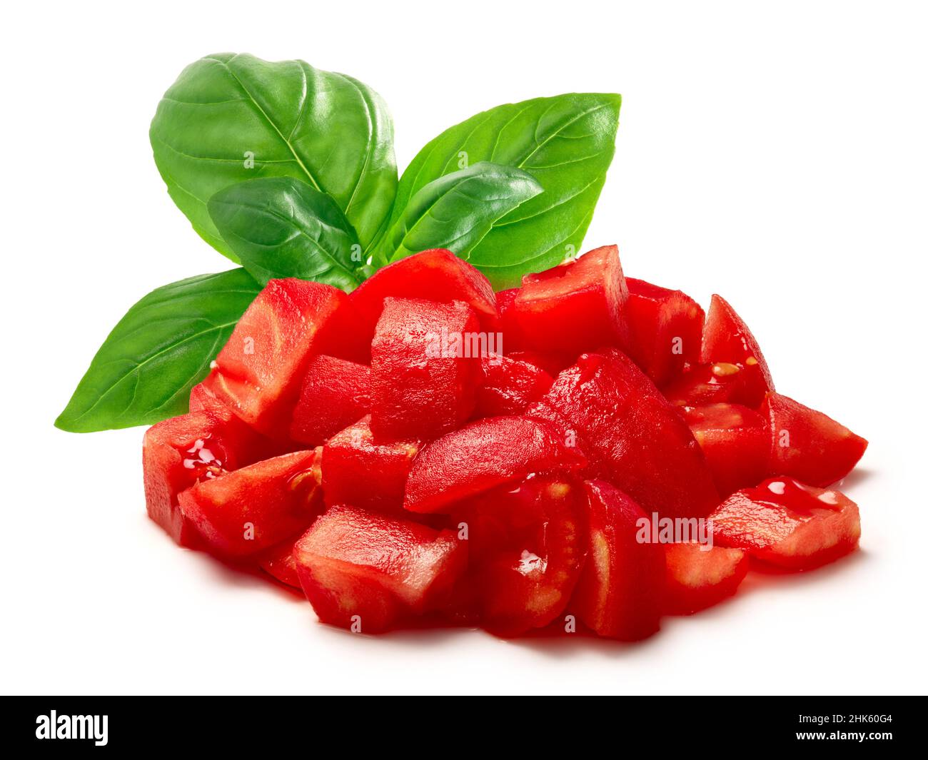 Chopped peeled tomato with basil, a pile of, isolated Stock Photo