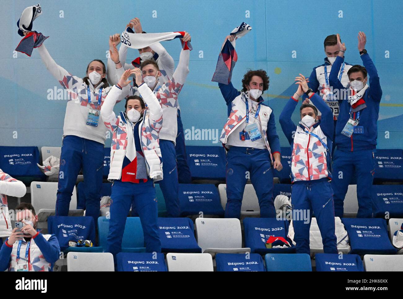Beijing, China. 2nd Feb, 2022. Atheltes and staffs of Czech Republic celebrate after beating Norway at the curling mixed doubles round robin event of the Beijing 2022 Winter Olympic Games in Beijing, China, Feb. 2, 2022. Credit: Wang Fei/Xinhua/Alamy Live News Stock Photo