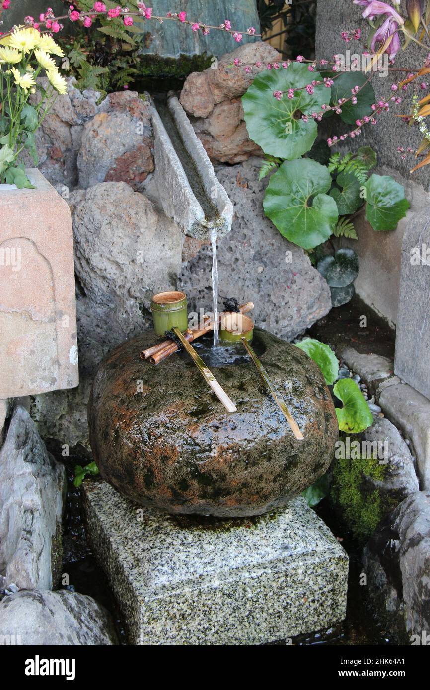 fountain with wooden ladles for ablutions in matsue (japan) Stock Photo