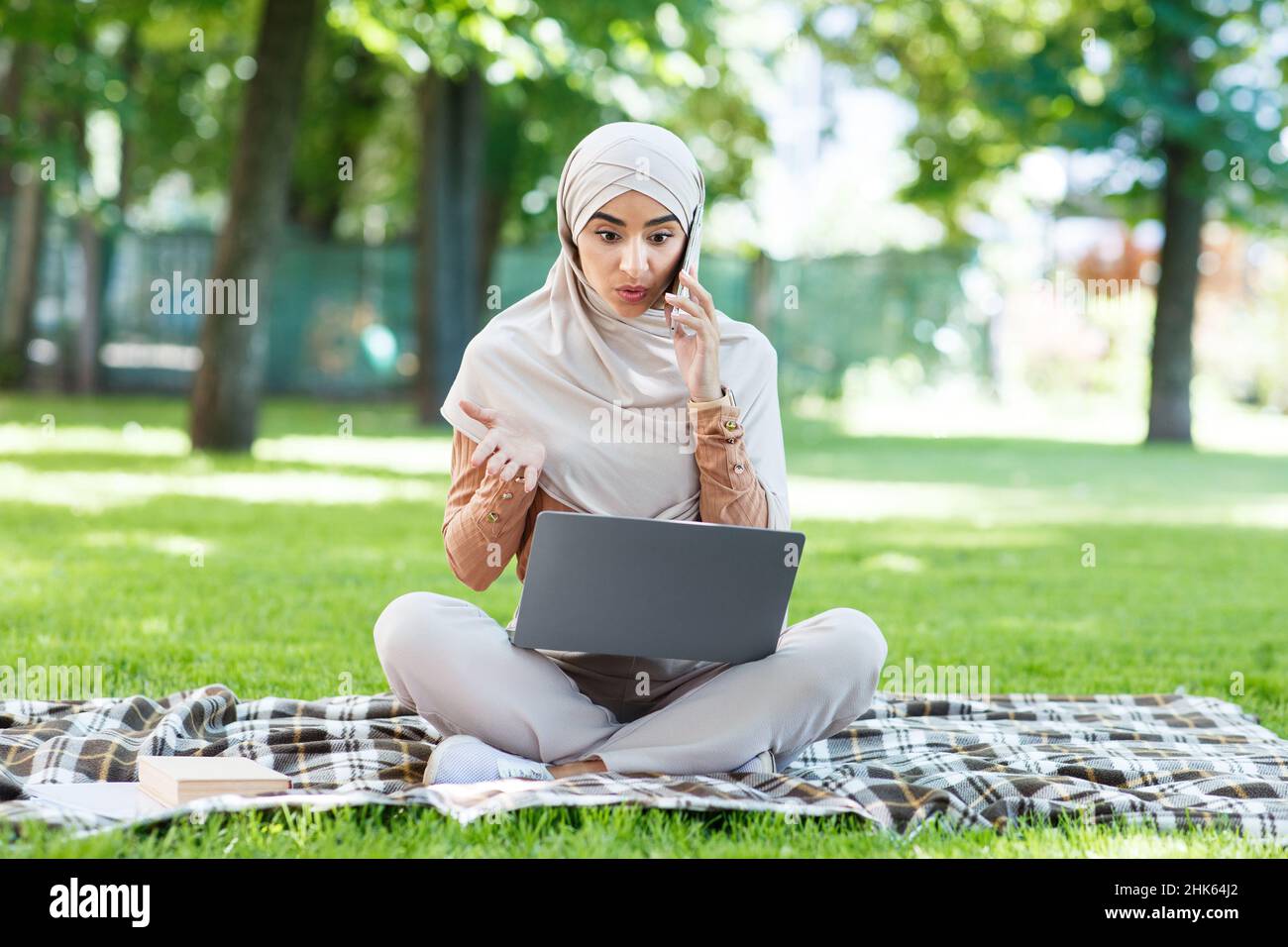 Businesswoman working outdoors, modern worker, freelance, insider, independent contractor Stock Photo