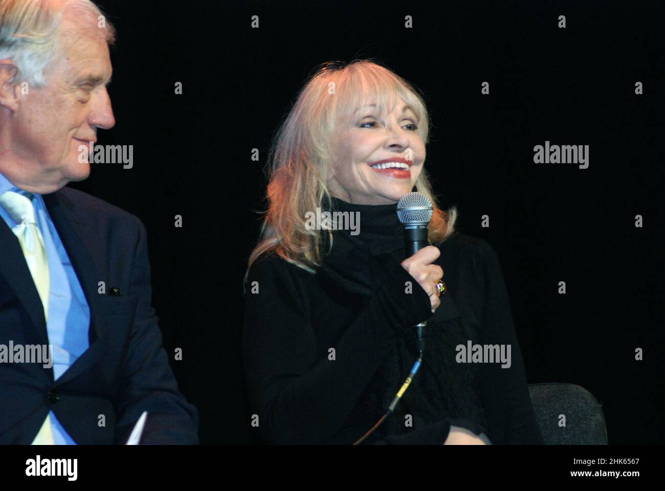 Tv, film and theatre actress Katy Manning on stage with Richard Franklin Wimbledon Theatre. Katy is best known as Jo Grant to Jon Pertwee's Doctor Who Stock Photo