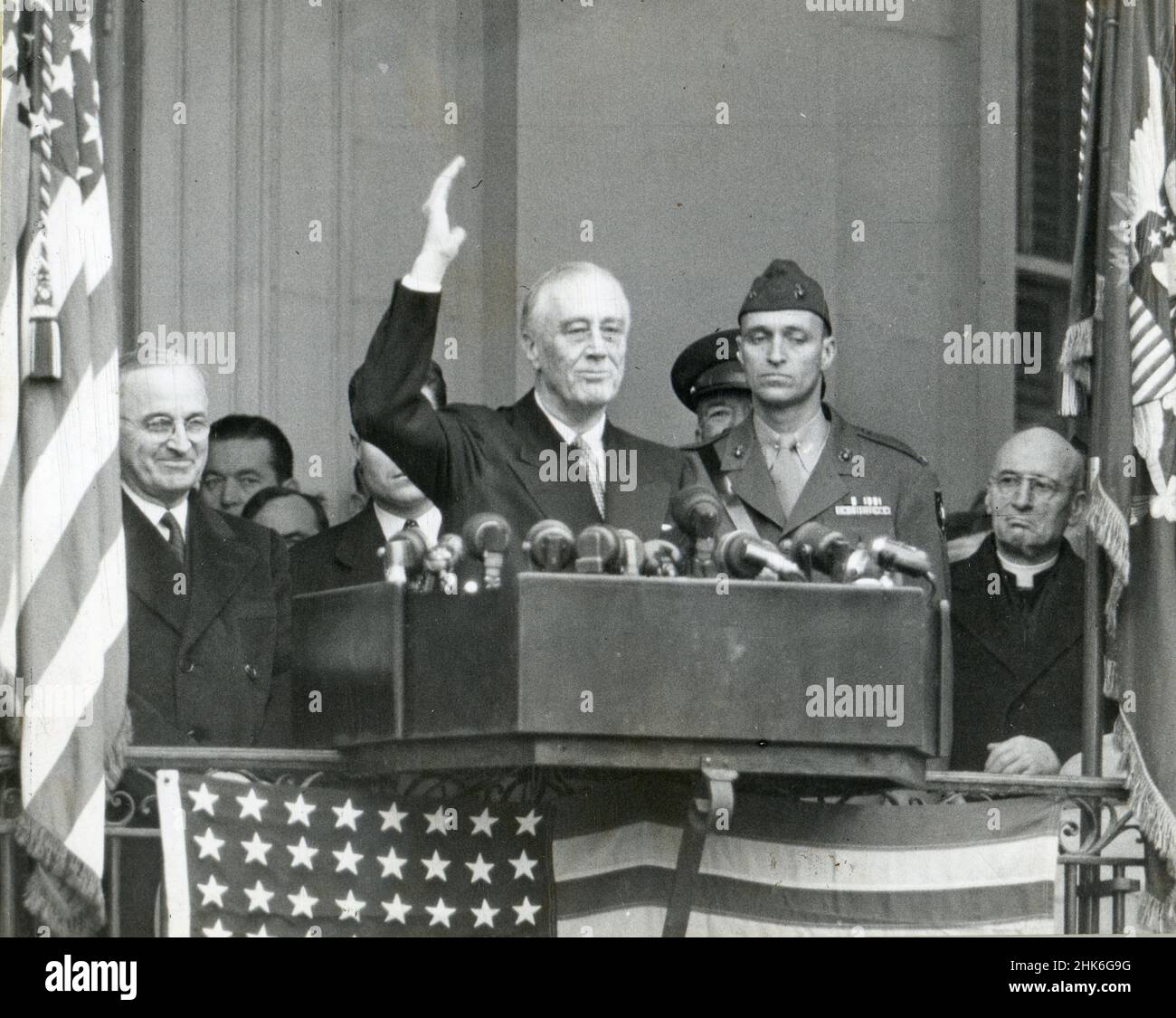 January 20, 1945, Washington, DC - Franklin Delano Roosevelt shown just after taking his 4th Oath of Office. The ceremony only lasted 15 minutes. Vice-President Harry Truman is on the left and Roosevelt's son James stands next to his father, Washington, DC. Stock Photo