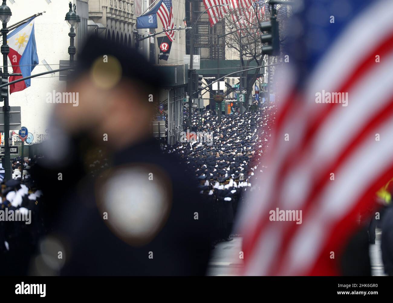 New York, United States. 02nd Feb, 2022. Thousands of police officers salute as the funeral precession of fallen NYPD Police Officer Wilbert Mora moves down Fifth Avenue after funeral services at St. Patrick's Cathedral in New York City on Wednesday, February 2, 2022. Officers Wilbert Mora and Jason Rivera were gunned down in an ambush on a domestic violence call at a Harlem apartment. Photo by John Angelillo/UPI Credit: UPI/Alamy Live News Stock Photo