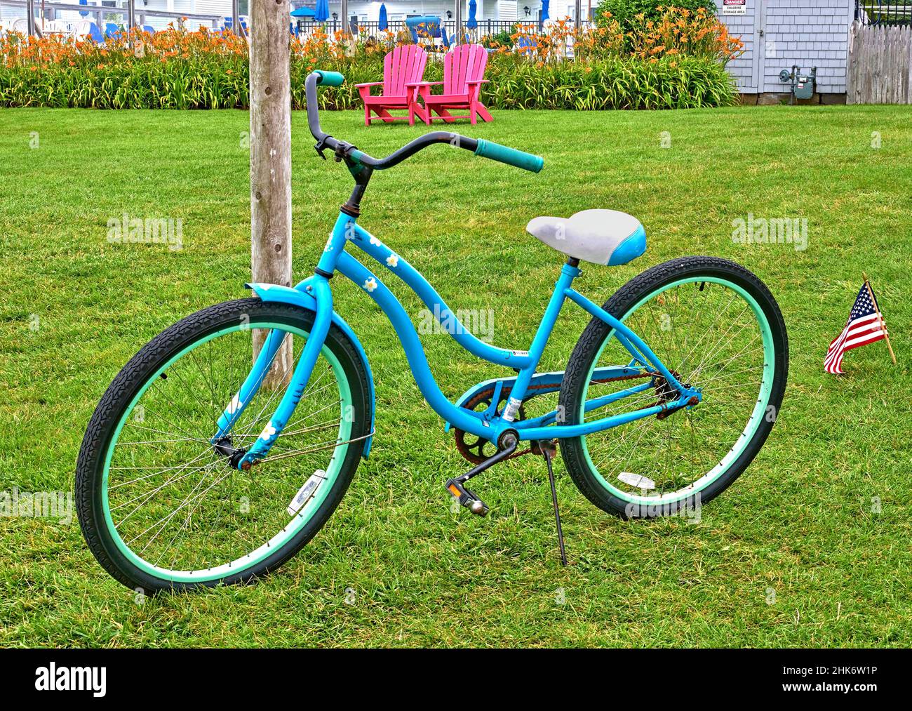 Cute blue girls bike or bicycle. Near the Entrance to Hyannis harbor,on Lewis Bay in Cape Cod Massachusetts,USA. Stock Photo