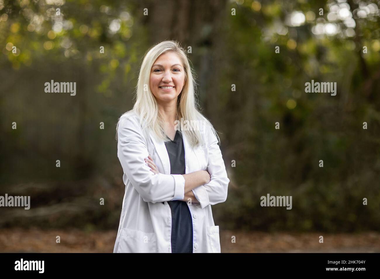Caucasian blond girl lab coat hi-res stock photography and images - Alamy