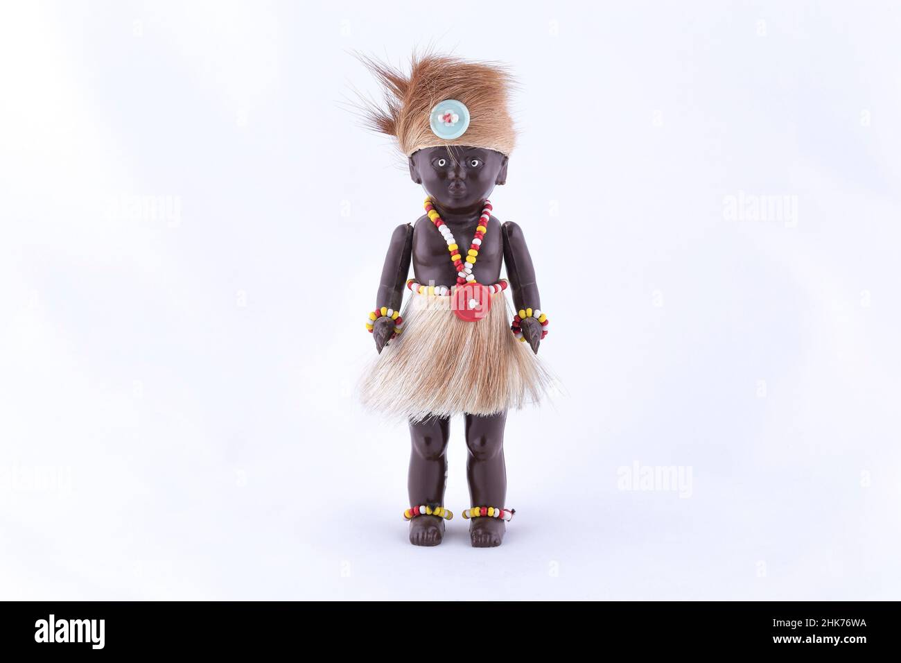 A Handmade Black Doll On White Background Stock Photo