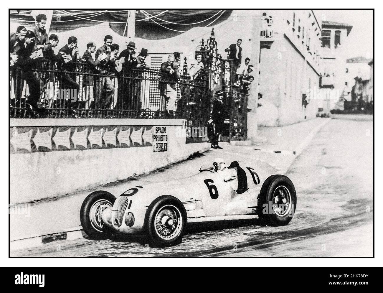 Hermann Lang  Mercedes No 6 at Montenero 1937 coming in a very close second to his Mercedes team mate. The 1937 Italian Grand Prix was held on September 12 at the Montenero Circuit near Livorna. Polesitter Rudolf Caracciola won a tough battle with Mercedes o Hermann Lang less than a second behind at the finish. Bernd Rosemeyer was third in an Auto Union. Stock Photo