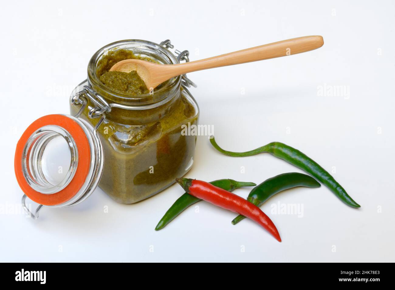 Green Thai curry paste in jar and chillies Stock Photo Alamy